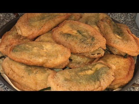 Golden chiles rellenos prepared for restaurant service